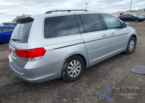 2010 Honda Odyssey Ex z USA, uszkodzony, nr VIN 5FNRL3H44AB101312